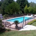Des barri&egrave;res de s&eacute;curit&eacute; piscine d&eacute;montables