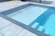 L'option Volet Immerg&eacute; avec finitions gr&egrave;s c&eacute;rame de G&eacute;n&eacute;ration Piscine