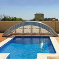 Nouvel abri piscine t&eacute;lescopique sur roulettes